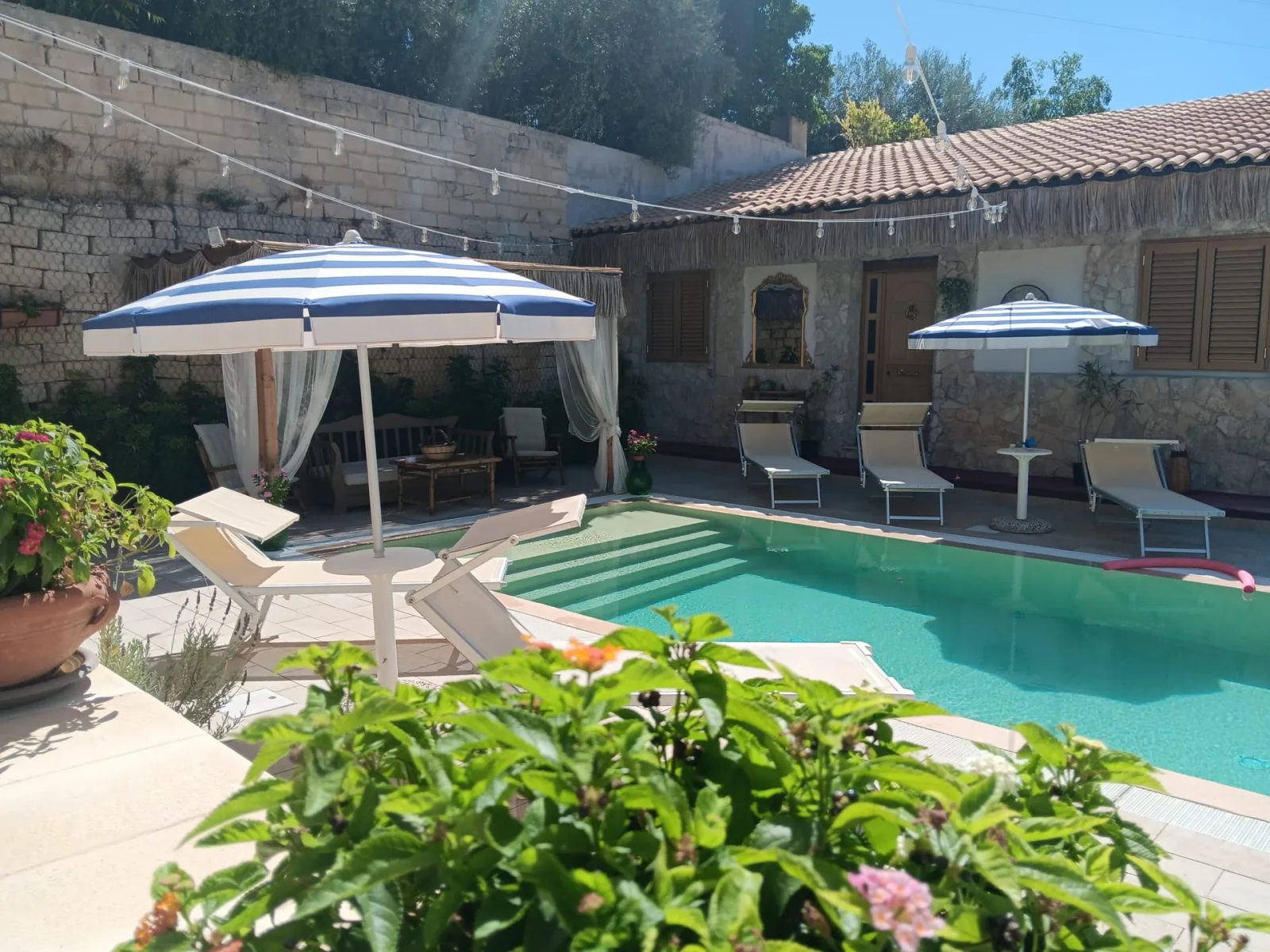 Villa pool and terrace in the Noto countryside