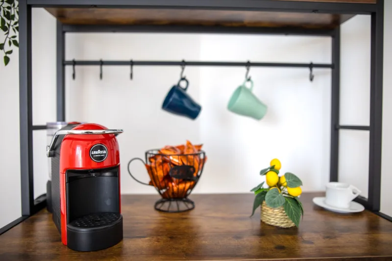 Coffee corner with espresso machine and mugs